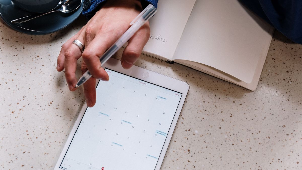 Estimating the hours spent tallying meeting schedules against a booking tool's cost
