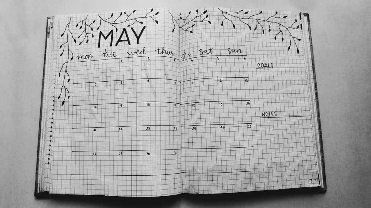 An open weekly planner with appointments written in — choosing a scheduling tool