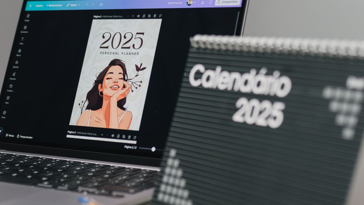 A desk calendar and laptop used to check a booking change